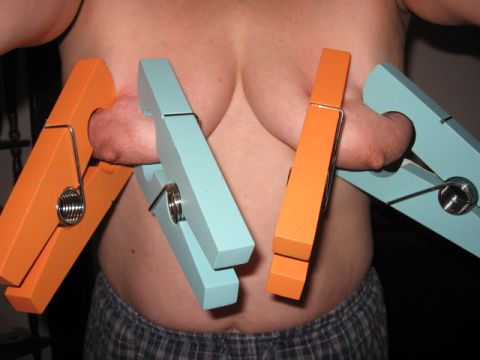 big clothespins on titties