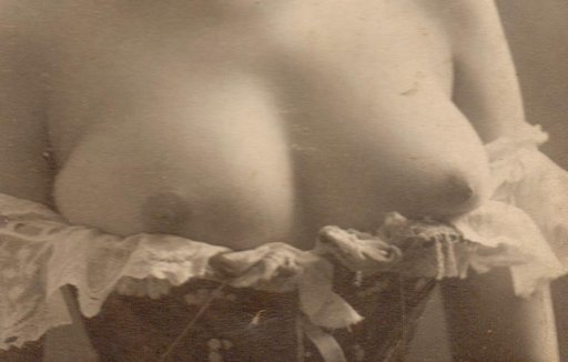 vintage titties above a lace corset