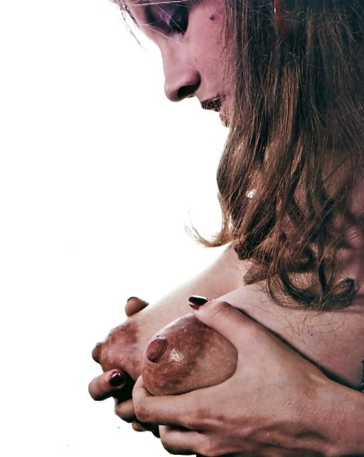woman examining her own titties